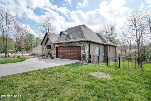 12 Inwood Dr, Fairfield Glade, TN 38558 - view of side of property with fence, a yard, an attached garage, concrete driveway, and stone siding