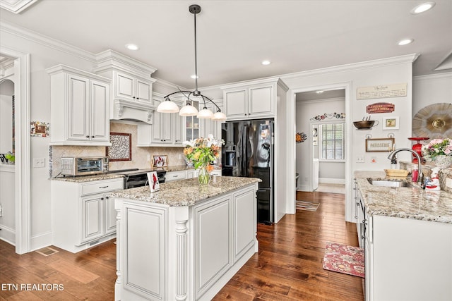 12 Inwood Dr, Fairfield Glade, TN 38558 - kitchen with a sink, tasteful backsplash, dark wood-type flooring, and black refrigerator with ice dispenser