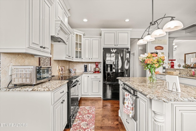 12 Inwood Dr, Fairfield Glade, TN 38558 - kitchen featuring backsplash, white cabinetry, black appliances, and dark wood-type flooring