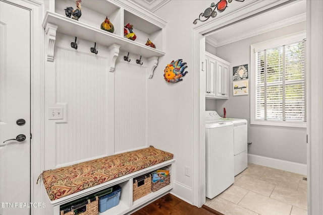 12 Inwood Dr, Fairfield Glade, TN 38558 - mudroom with light tile patterned floors, washing machine and dryer, baseboards, and ornamental molding