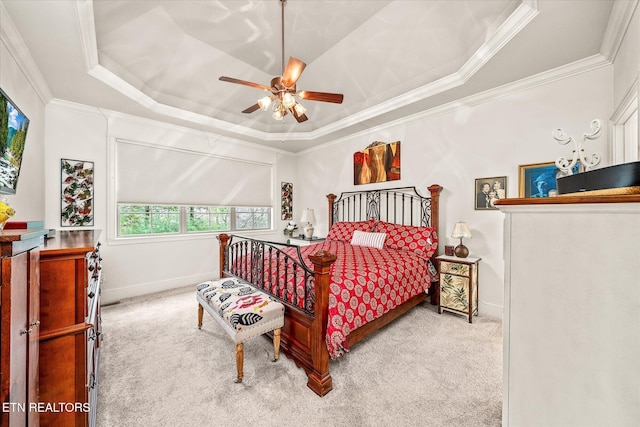 12 Inwood Dr, Fairfield Glade, TN 38558 - carpeted bedroom featuring a tray ceiling, a ceiling fan, baseboards, and ornamental molding