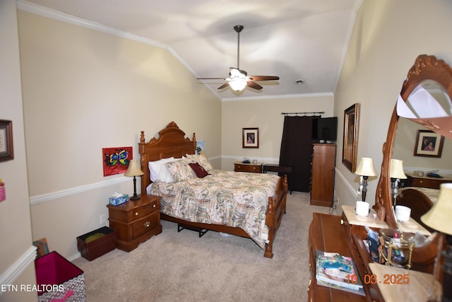 bedroom with light carpet, crown molding, ceiling fan, and vaulted ceiling