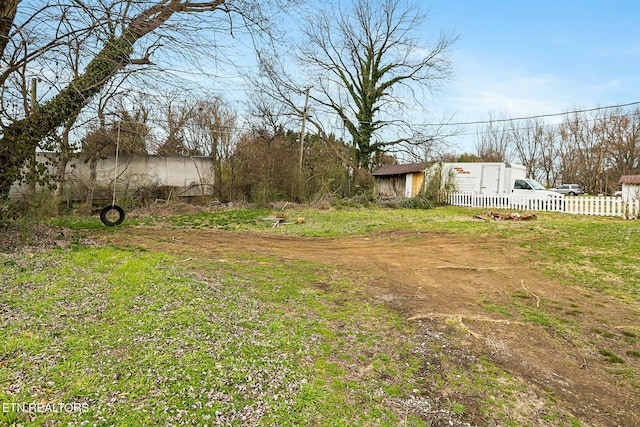 view of yard featuring fence