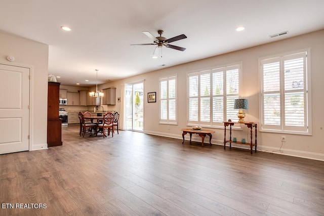 interior space featuring recessed lighting, visible vents, and dark wood-style floors