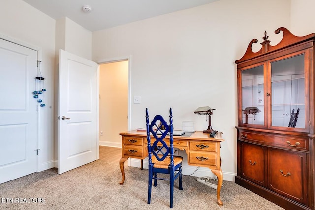 office area with baseboards and carpet flooring