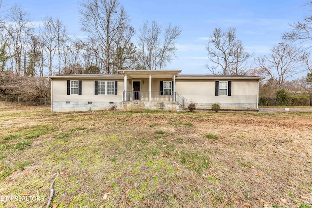 manufactured / mobile home featuring crawl space and covered porch