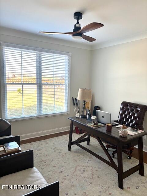 home office with wood finished floors, baseboards, and ceiling fan