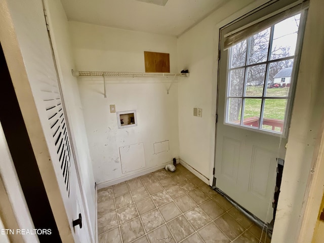 laundry area with washer hookup, laundry area, and baseboards