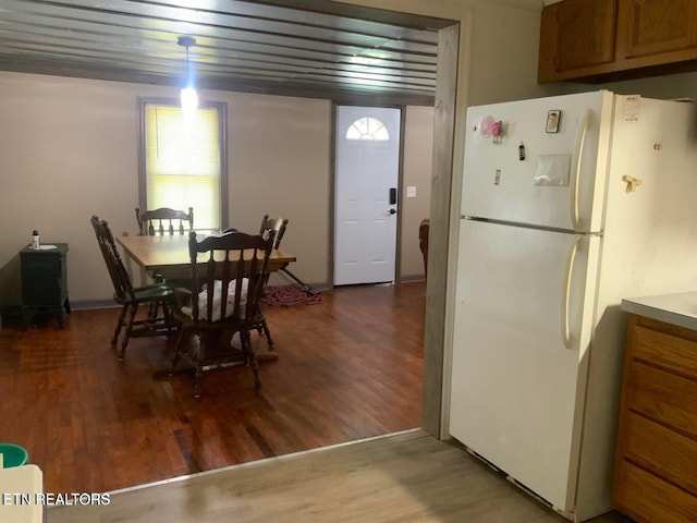 dining area featuring wood finished floors