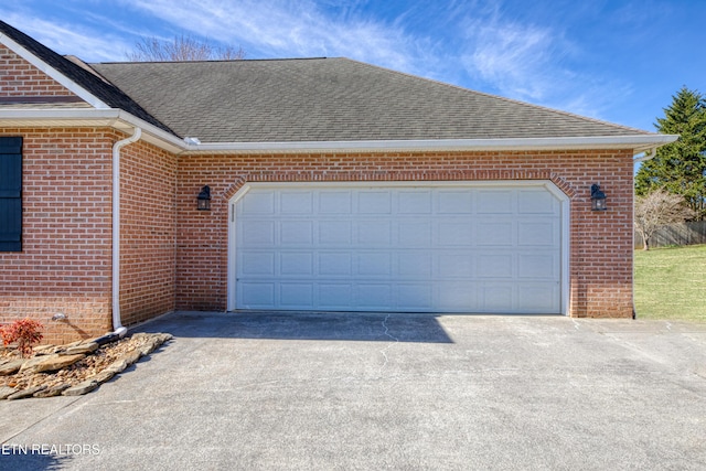 garage featuring driveway