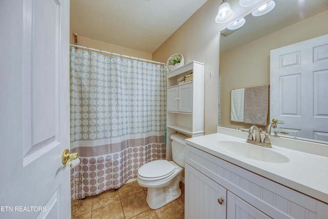 bathroom with tile patterned floors, toilet, a textured ceiling, a shower with shower curtain, and vanity