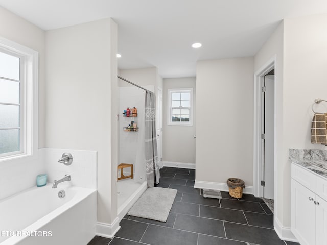 full bath with tile patterned floors, a stall shower, vanity, and a bath