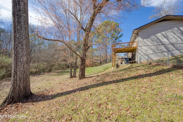 view of yard featuring a wooden deck