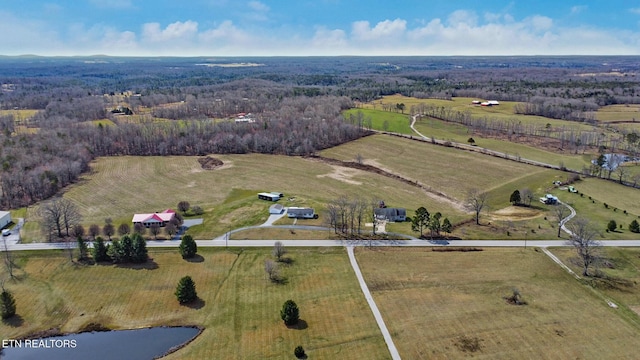 birds eye view of property featuring a rural view