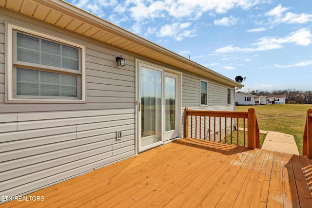 deck featuring a lawn