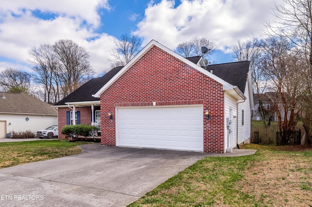 view of front of property featuring a front lawn, a garage, and brick siding