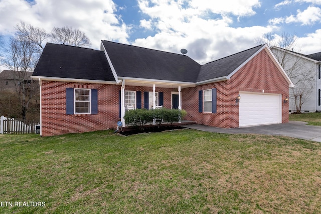 view of front of house featuring aphalt driveway, brick siding, and a front lawn