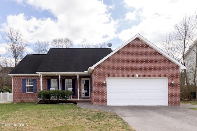 ranch-style house with a front lawn, fence, concrete driveway, an attached garage, and brick siding