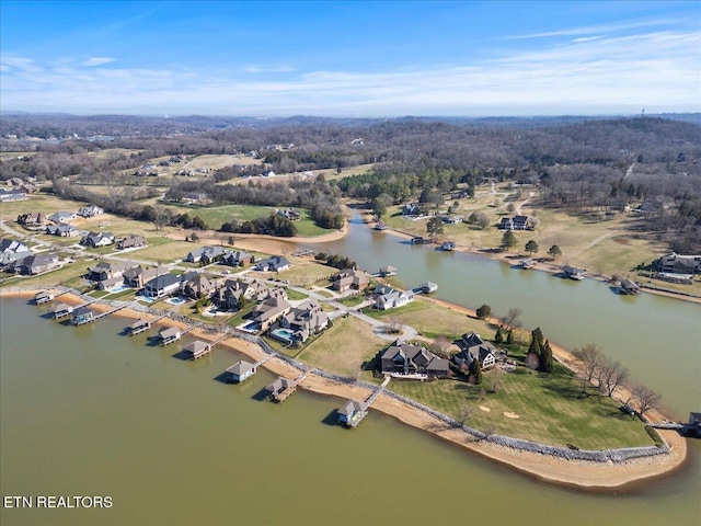 bird's eye view featuring a residential view and a water view