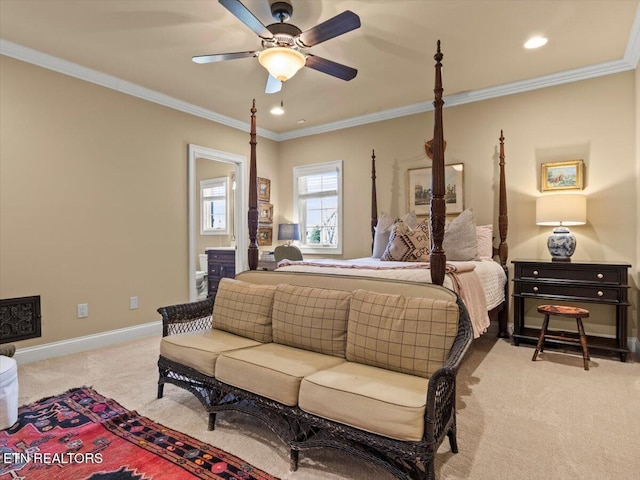 carpeted bedroom featuring crown molding, baseboards, ceiling fan, recessed lighting, and ensuite bathroom