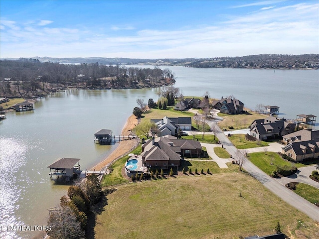 aerial view featuring a residential view and a water view