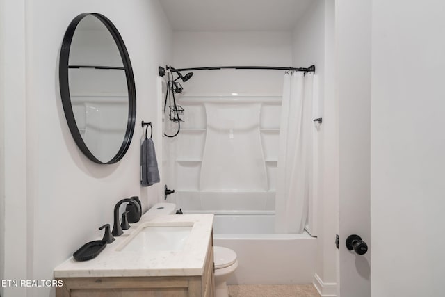 bathroom featuring vanity, toilet, and shower / tub combo