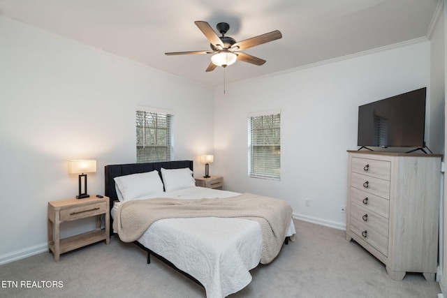 bedroom featuring multiple windows and crown molding