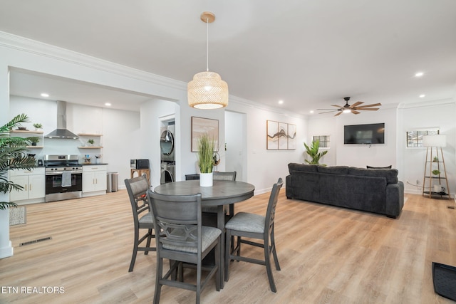 dining room with baseboards, ornamental molding, recessed lighting, light wood-style floors, and a ceiling fan