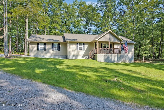 single story home with covered porch and a front lawn