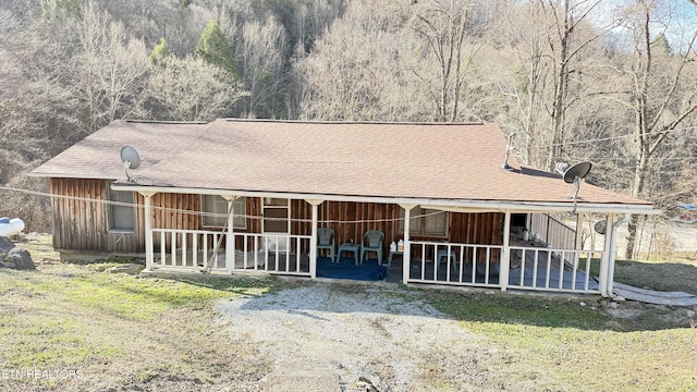 view of front of property with an outbuilding and an exterior structure