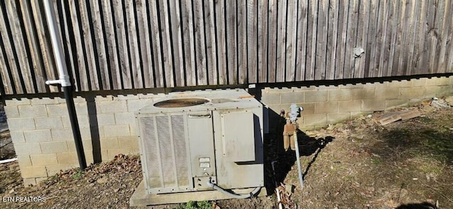 234 Habersham Rd, Duff, TN 37729 - details with cooling unit and concrete block siding