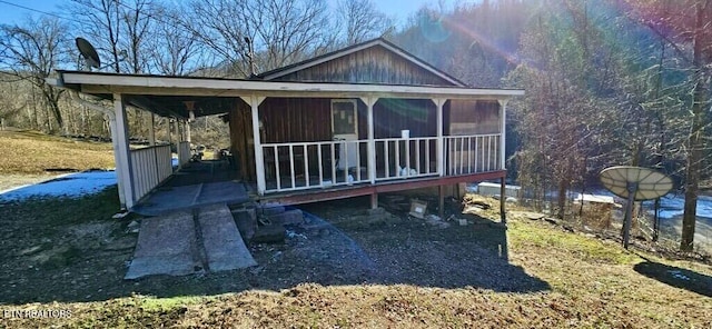 234 Habersham Rd, Duff, TN 37729 - rear view of property featuring a sunroom