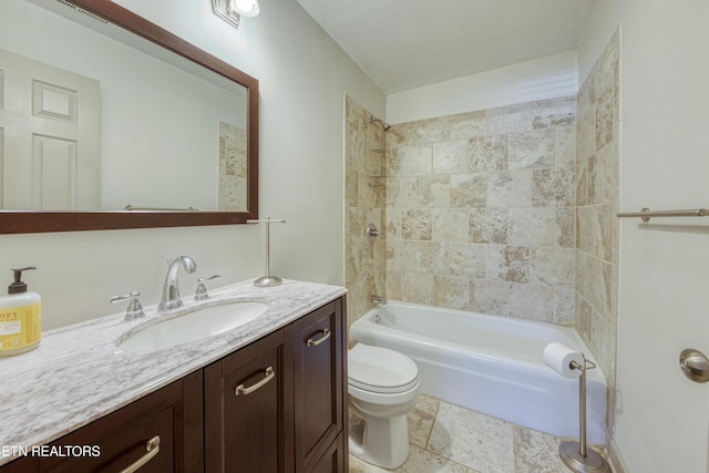 bathroom featuring shower / bathtub combination, toilet, and vanity