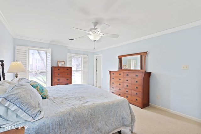 bedroom with baseboards, light carpet, a ceiling fan, and crown molding