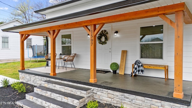 doorway to property with a patio
