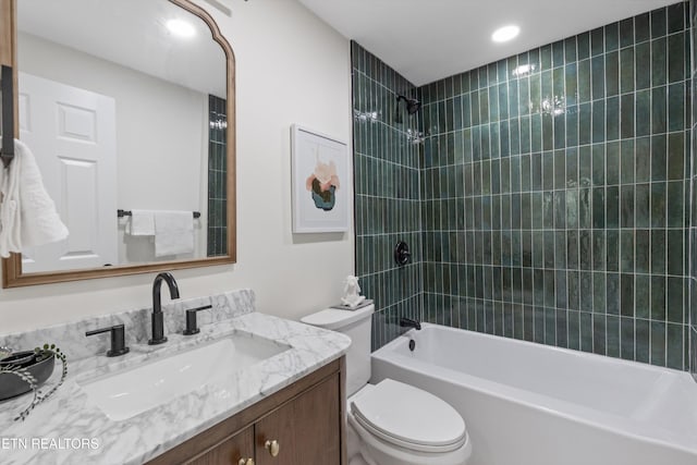 full bath with toilet, shower / tub combination, and vanity