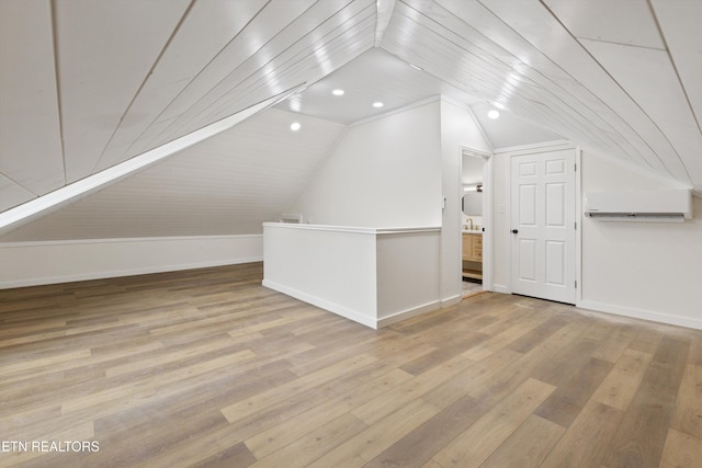 bonus room featuring baseboards, lofted ceiling, recessed lighting, and light wood-type flooring