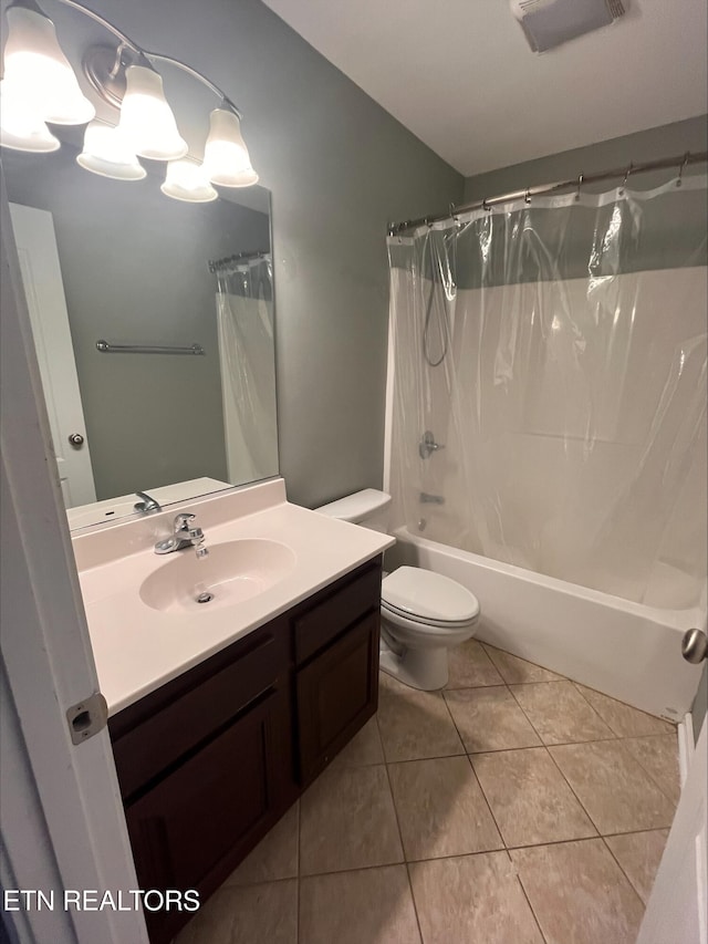 full bath with visible vents, toilet, shower / tub combo with curtain, tile patterned floors, and vanity