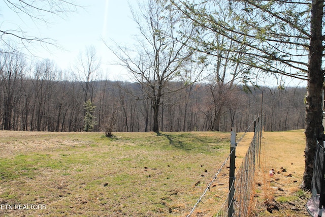 view of nature with a wooded view