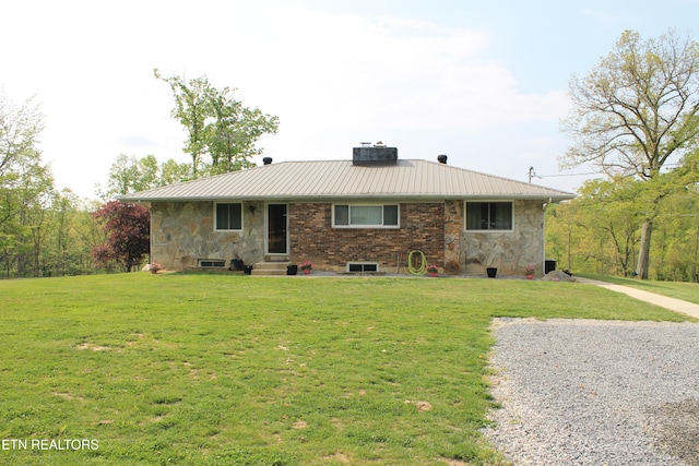 798 Christenson Rd, Deer Lodge, TN 37726 - back of property with a yard, entry steps, metal roof, and stone siding