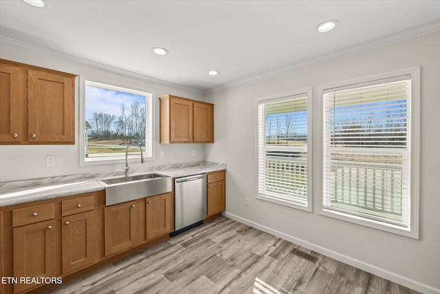 1600 Anna Maria Ln, Cookeville, TN 38501 - kitchen featuring stainless steel dishwasher, a sink, light wood finished floors, brown cabinetry, and ornamental molding
