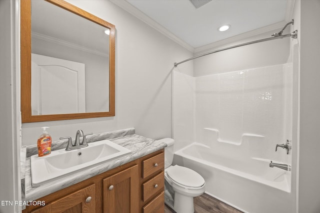 1600 Anna Maria Ln, Cookeville, TN 38501 - full bathroom with crown molding, wood finished floors, toilet, vanity, and tub / shower combination
