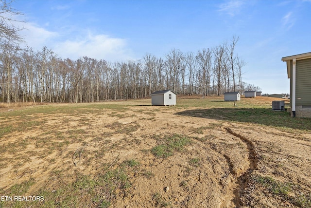 1600 Anna Maria Ln, Cookeville, TN 38501 - view of grassy yard with a shed and an outdoor structure