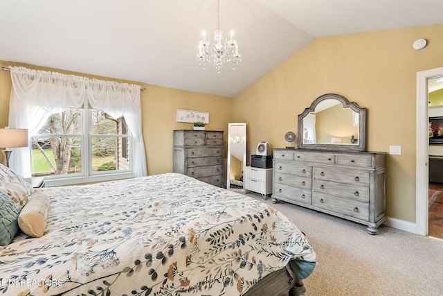 bedroom with vaulted ceiling, a notable chandelier, carpet flooring, and baseboards