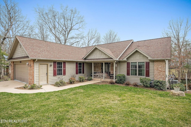 ranch-style home featuring roof with shingles, an attached garage, covered porch, a front lawn, and brick siding