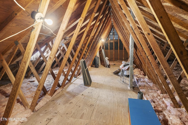 view of unfinished attic