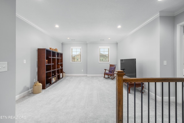 living area with recessed lighting, light colored carpet, baseboards, and ornamental molding