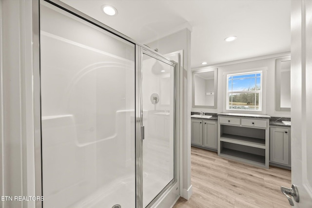 1620 Anna Maria Ln, Cookeville, TN 38501 - bathroom with a stall shower, vanity, wood finished floors, and recessed lighting