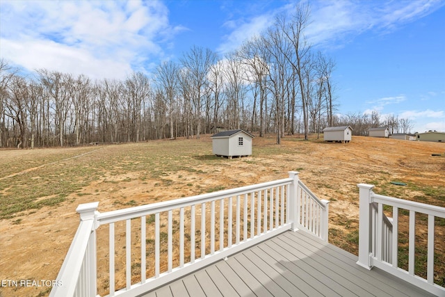 1620 Anna Maria Ln, Cookeville, TN 38501 - wooden deck featuring a storage unit and an outdoor structure