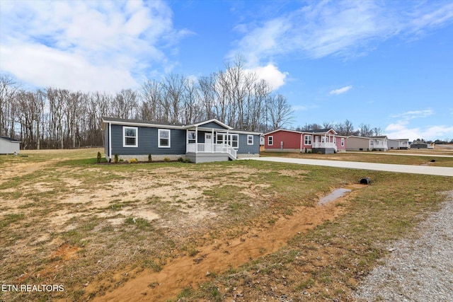 1620 Anna Maria Ln, Cookeville, TN 38501 - manufactured / mobile home featuring driveway and a front yard